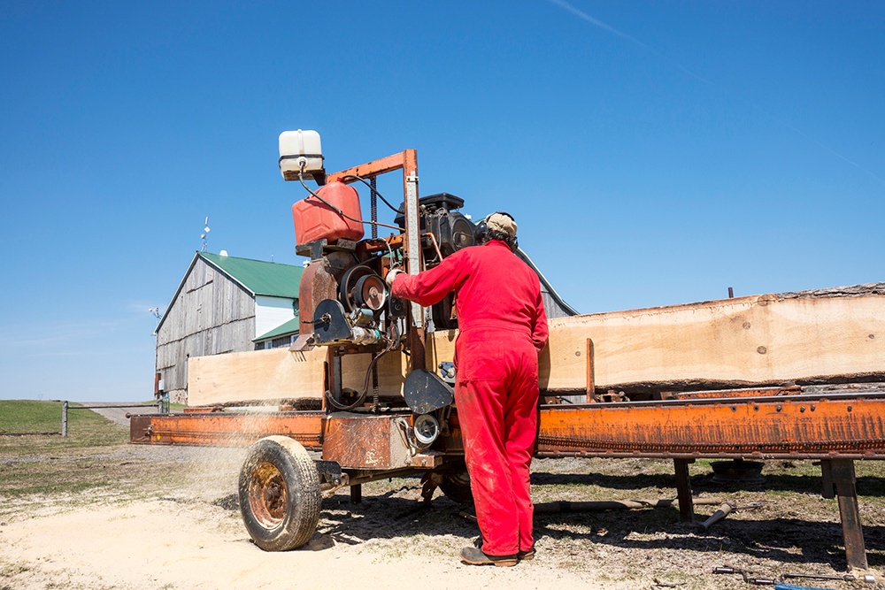 Using_a_portable_sawmill.jpg