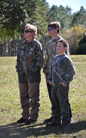 Adaire hunting with her sons Dustin and Payton